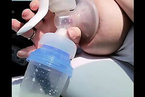 Pumping my milk tits empty in the car